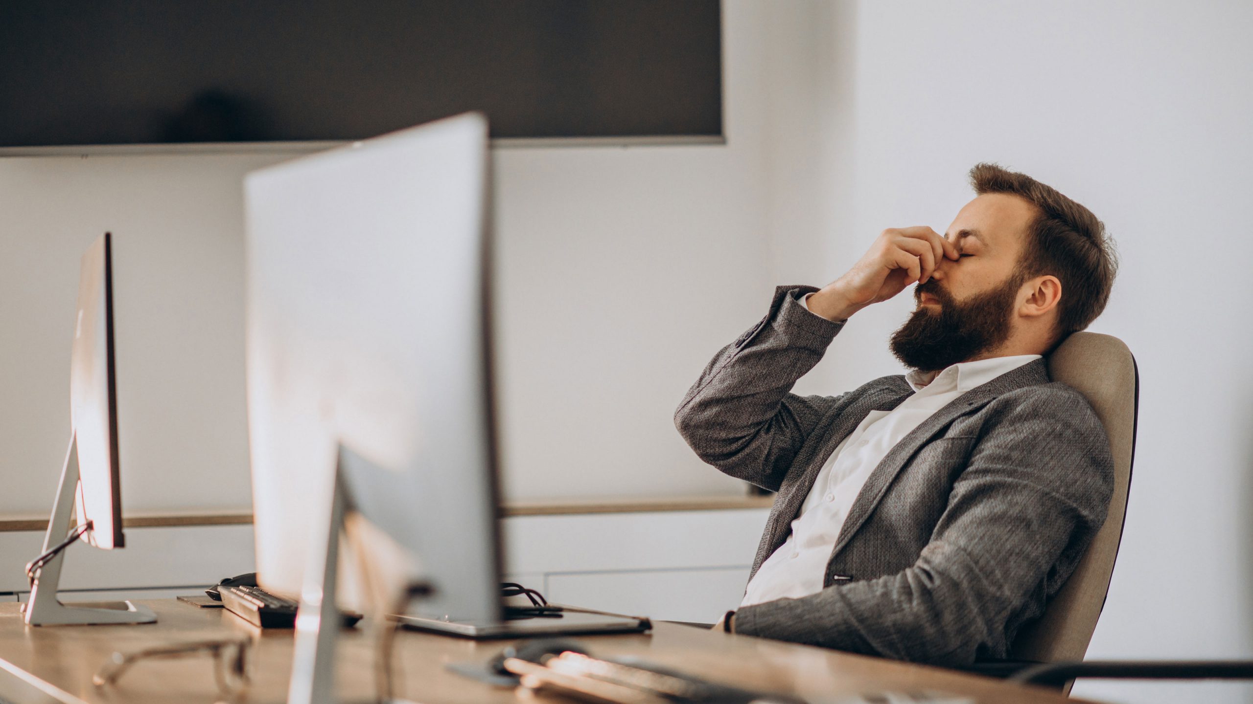 handsome-business-man-working-desk